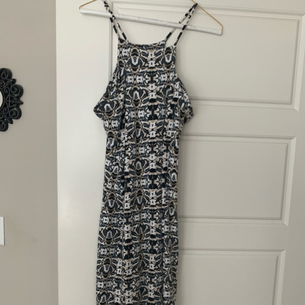 Fitted Aztec dress. Asymmetrical bottom